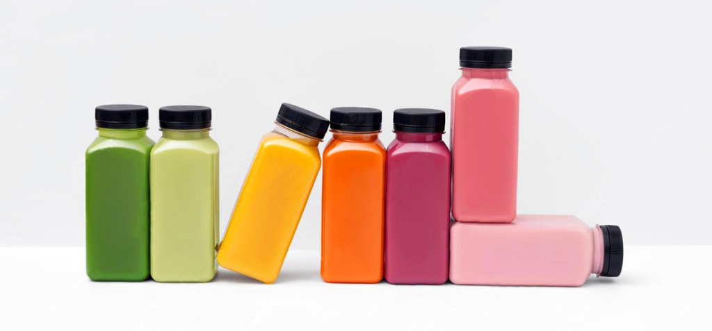 plastic-bottles-fresh-vegan-smoothie-white-minimal-background_663859-2035.jpg